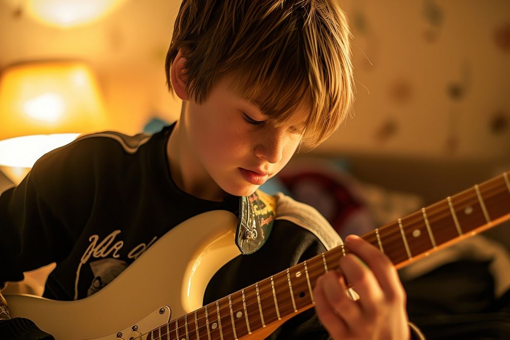 Electric guitar musician child boy.
