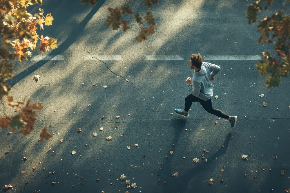 Healthy man running outdoors jogging.