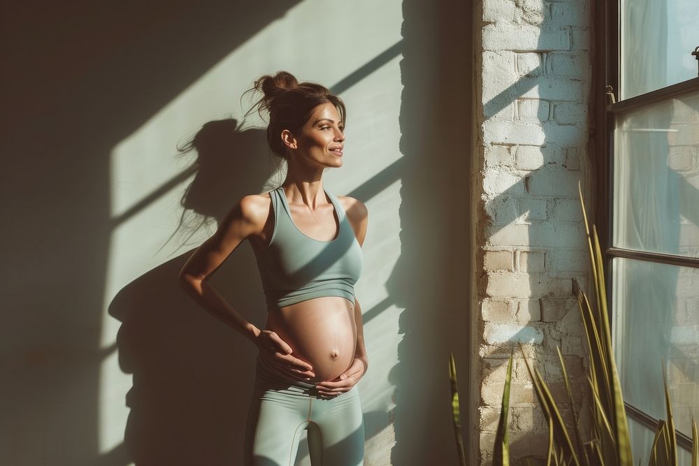 Pregnant woman sports adult determination.