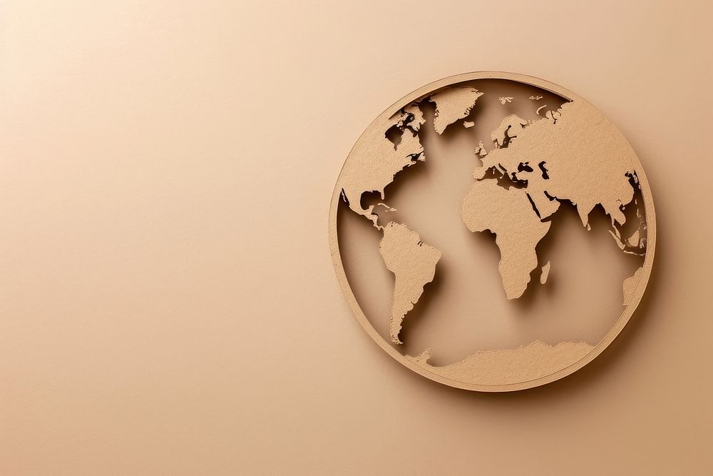 Brown paper cut out shape of the circle world planet globe space.