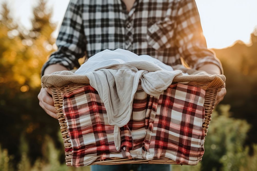 Man holding laundry basket adult tranquility relaxation.