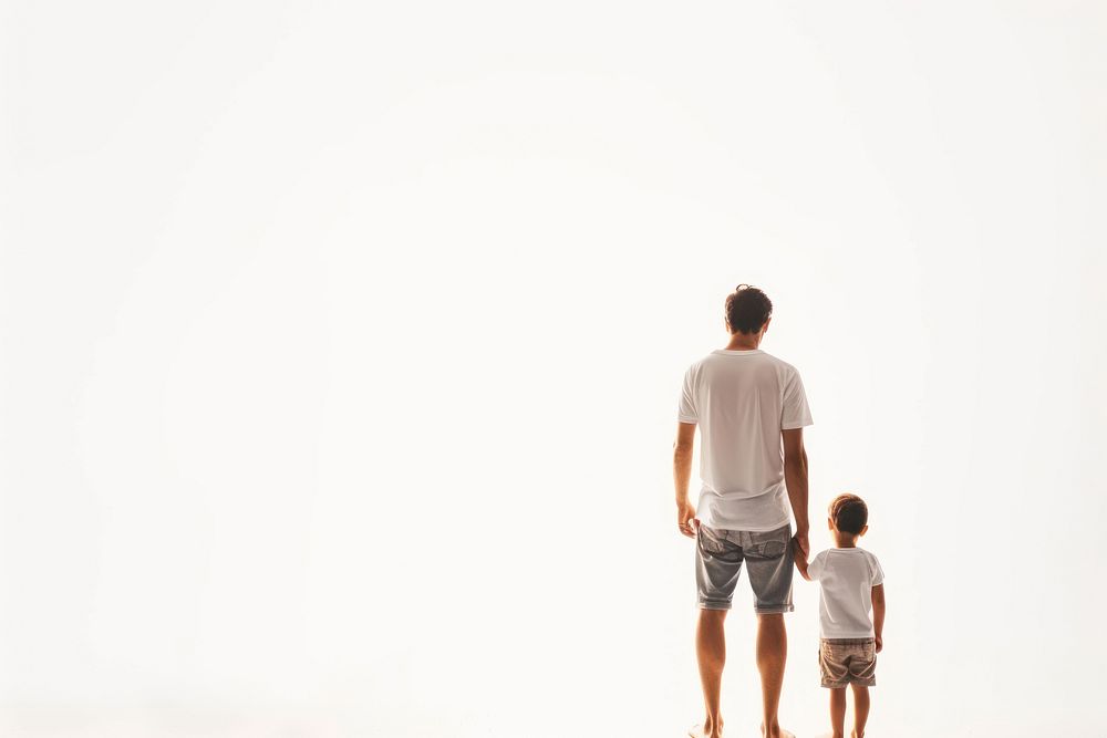 Father and son standing shorts adult.