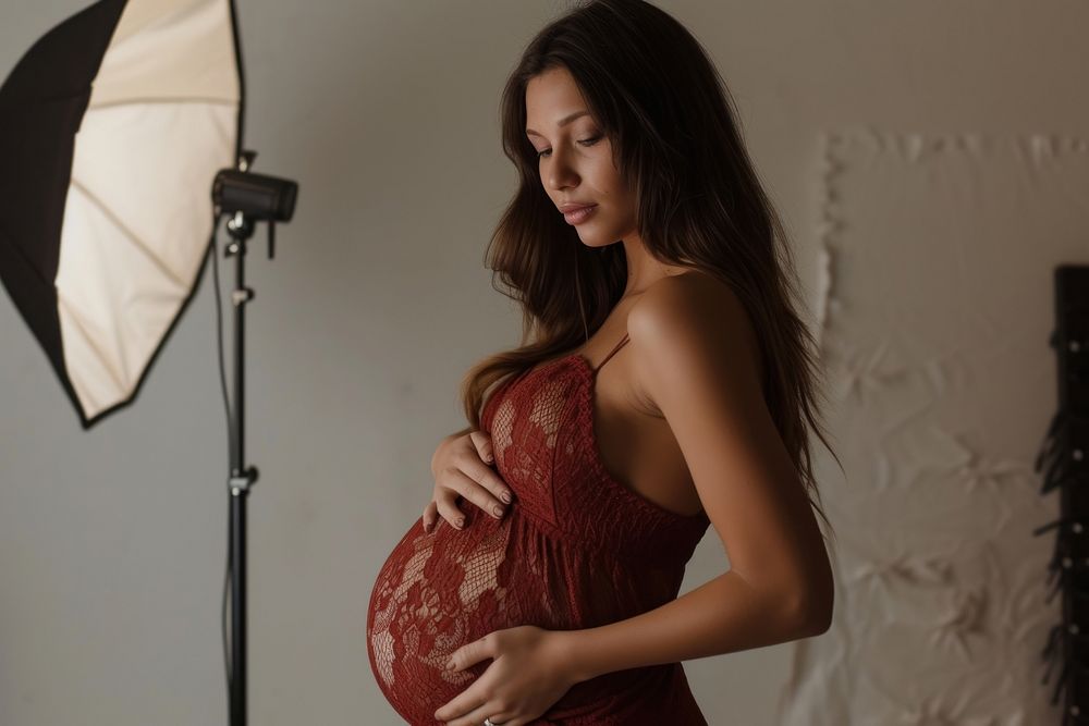 Pregnant woman photoshoot adult undergarment.