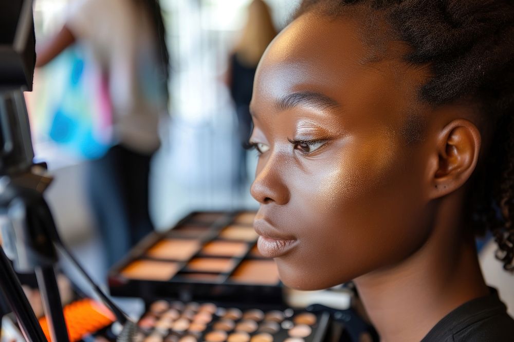 Black South African woman cosmetics makeup skin.