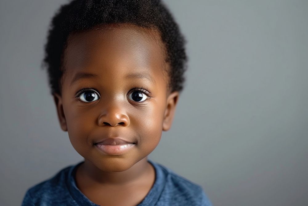Adorable African American little boy portrait child skin.