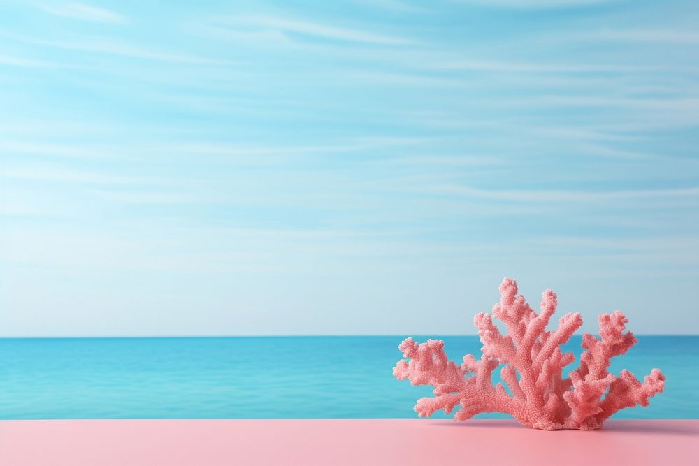 Light pinkish-coral ocean outdoors horizon.