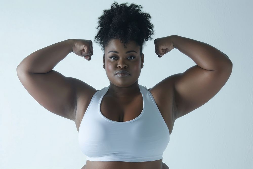 Fat black woman flexing muscle portrait sports adult.