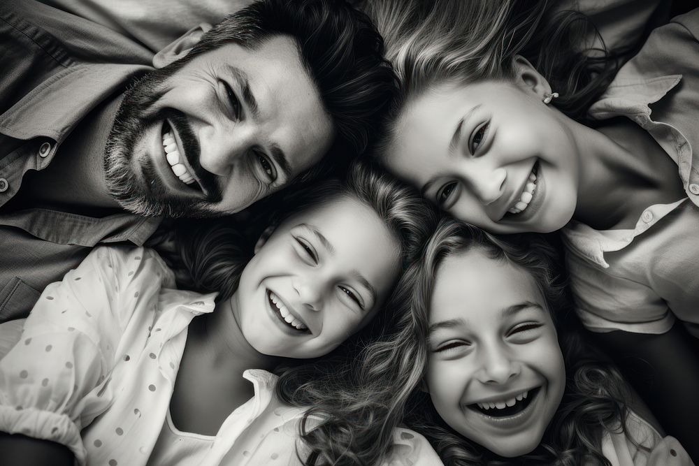 Latin Happy family lying on bed smile laughing portrait.