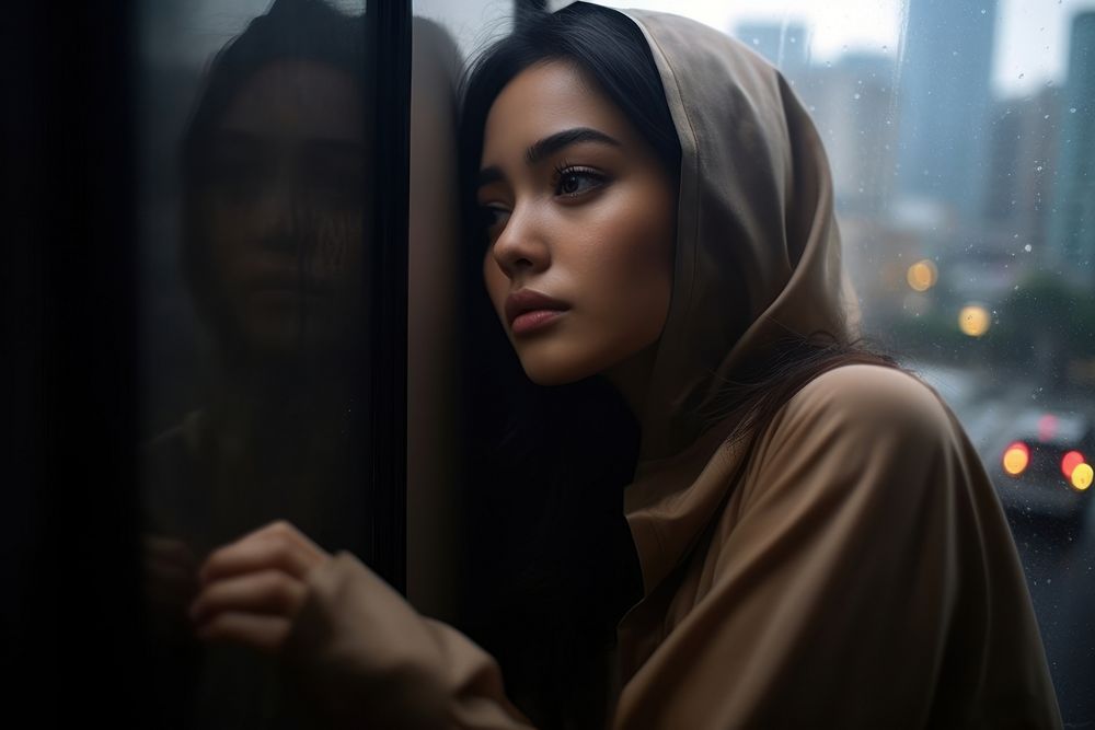 Woman Indonesian Melancholy Muse portrait worried window.