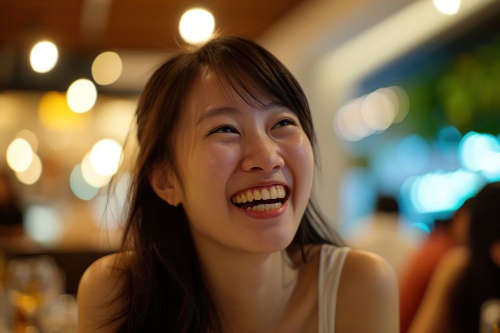 Woman Singaporean Joyful laughing adult smile.