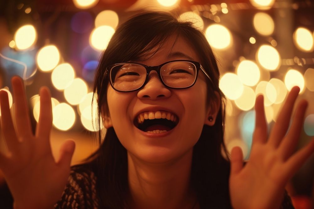 Woman Singaporean Joyful laughing glasses smile.