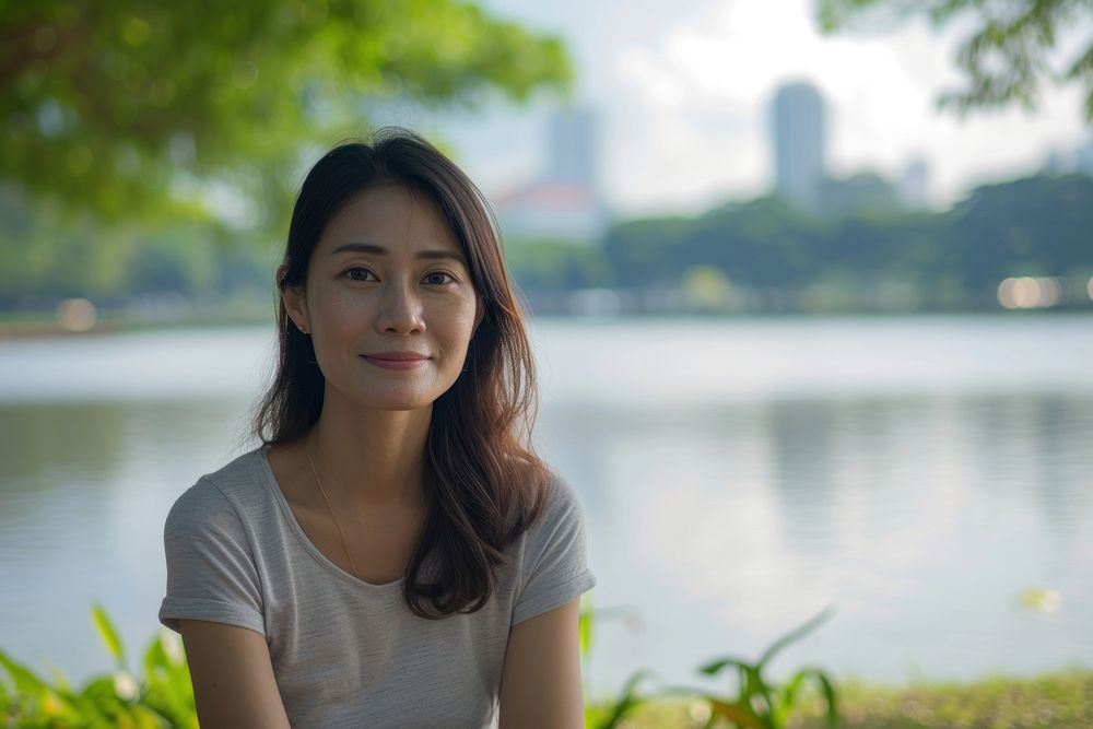 Woman Singaporean Peaceful landscape portrait photo.
