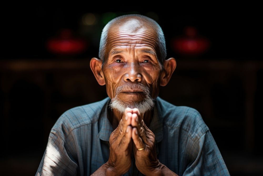Elder Vietnamese Contemplative Curiosity portrait adult photo.