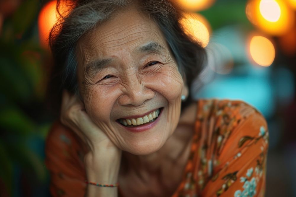 Elder Thai Joyful laughing adult smile.