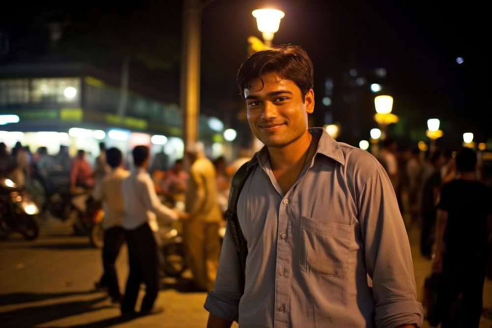 Indian man nightlife outdoors portrait.