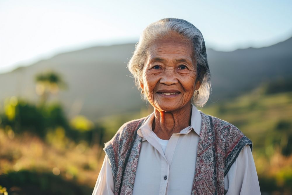 Elder Filipino Hopeful adult woman retirement.