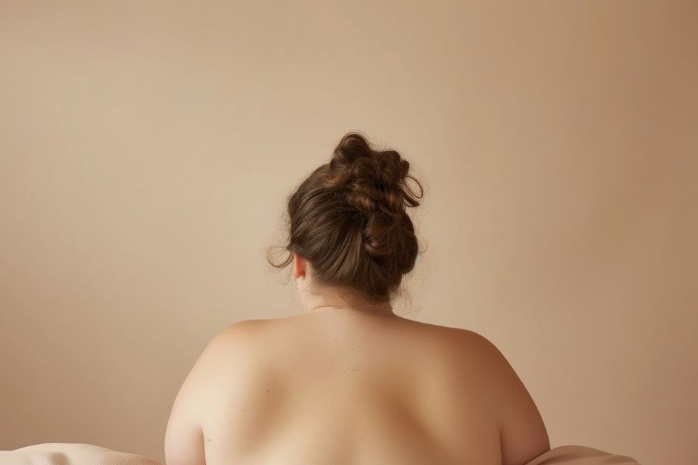 Chubby woman back skin undergarment relaxation semi-dress.