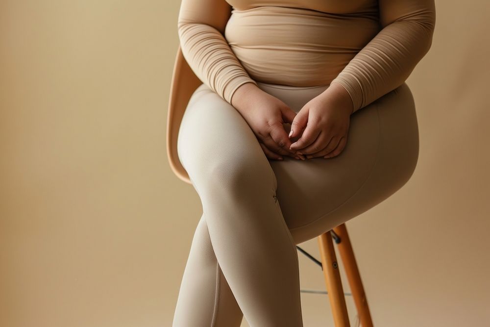 Chubby woman waist wearing exercise pants sitting adult anticipation.