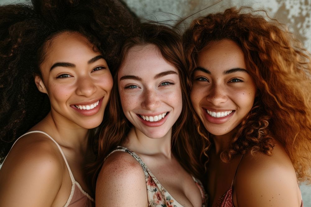 Women body types with different ethnicities smile laughing portrait.