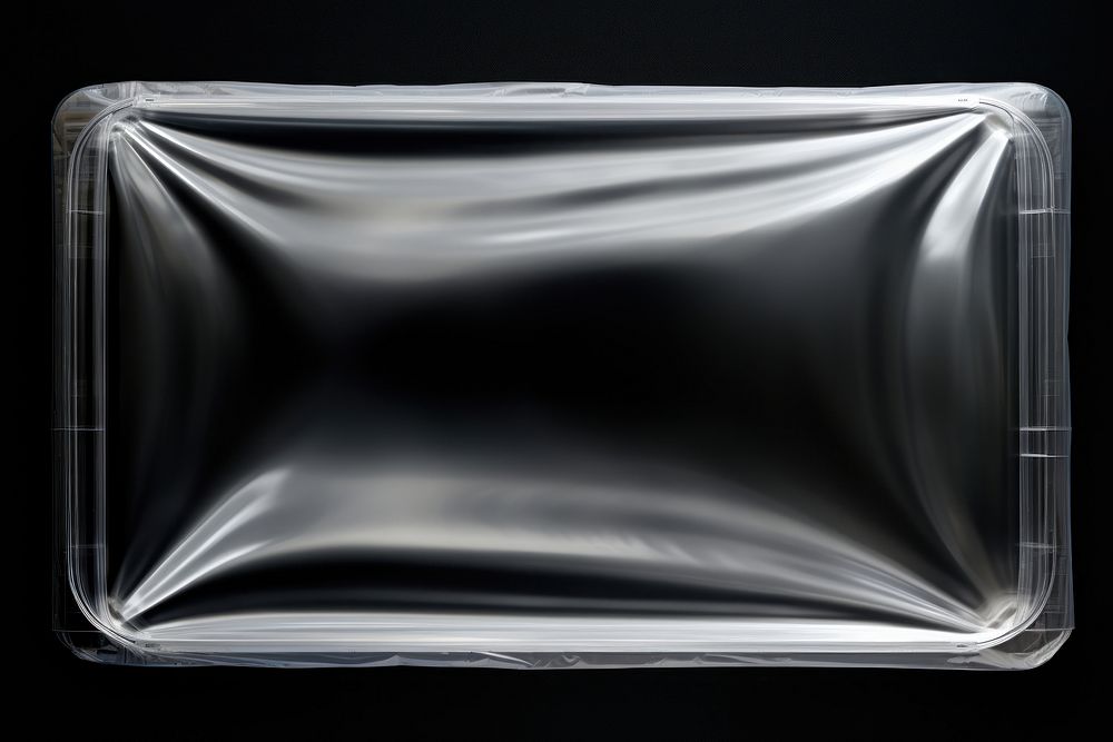  Transparent plastic wrap black background rectangle aluminium. AI generated Image by rawpixel.