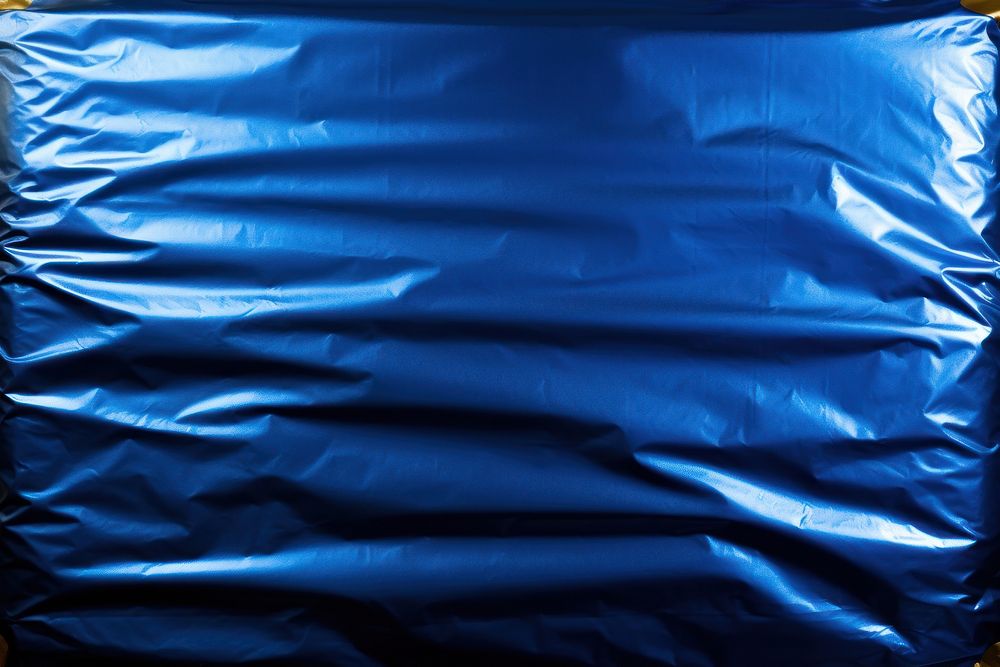  Blue backgrounds black crumpled. AI generated Image by rawpixel.