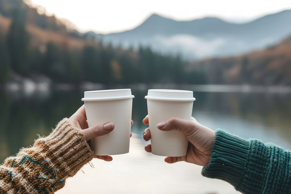 Coffee cup  hand outdoors holding.