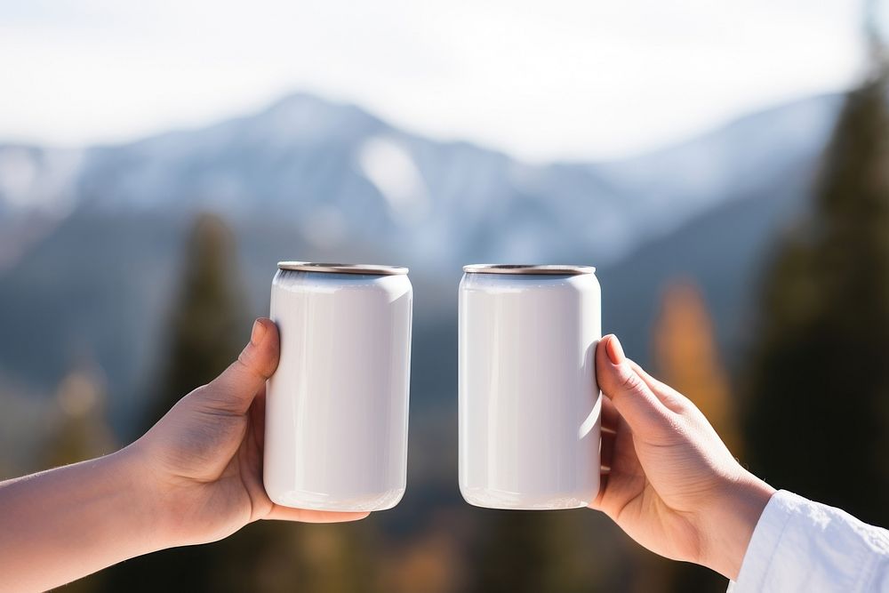 Stainless can  hand landscape mountain.