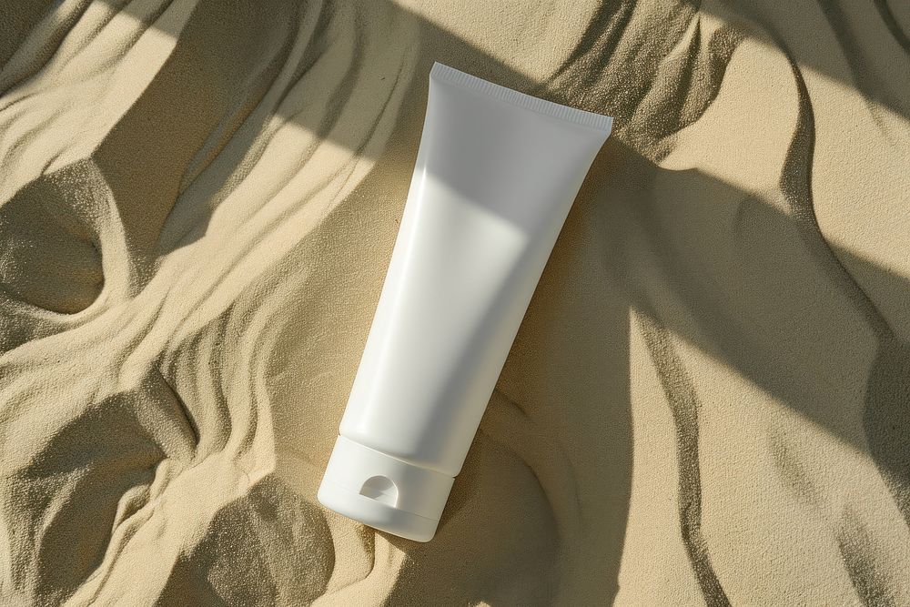 Tube packaging  outdoors sand cosmetics.