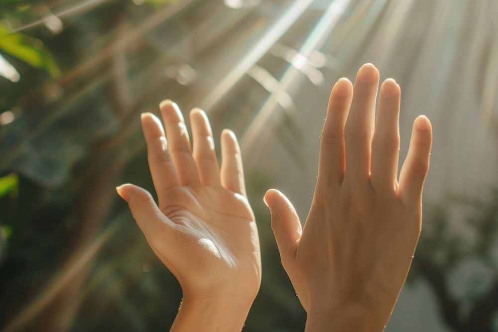 Creative people hands high five finger gesturing sunlight.