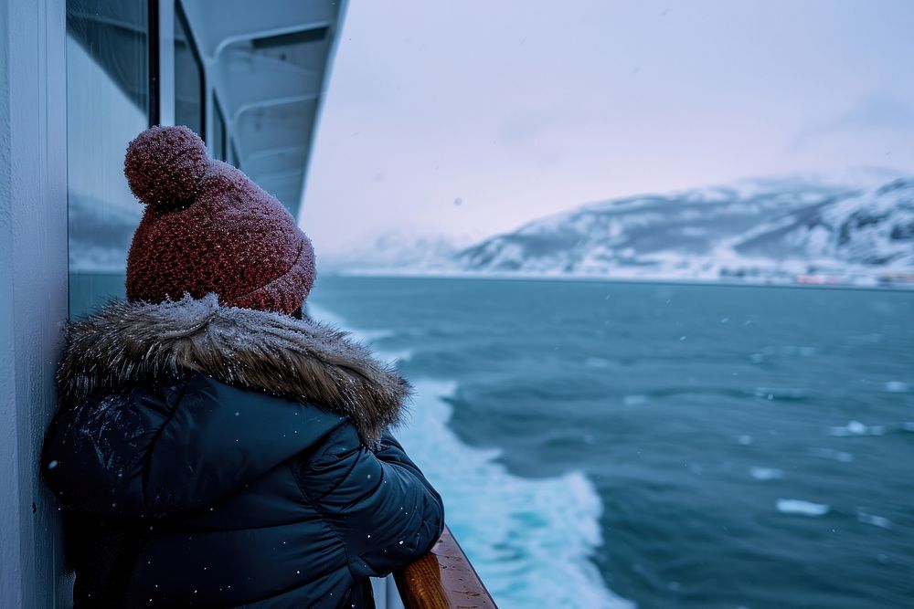 Woman on a cruise ship photography outdoors winter.