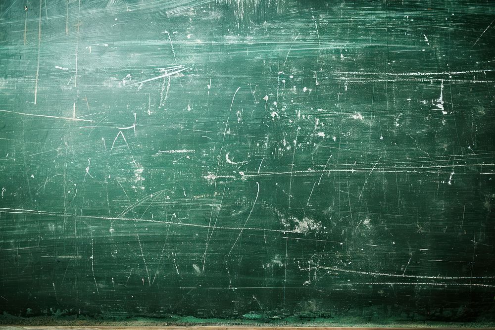 Chalk rubbed out on green chalkboard blackboard intelligence mathematics.