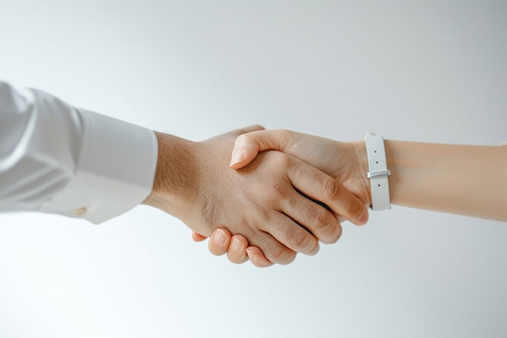 Hands of business people handshake togetherness agreement.
