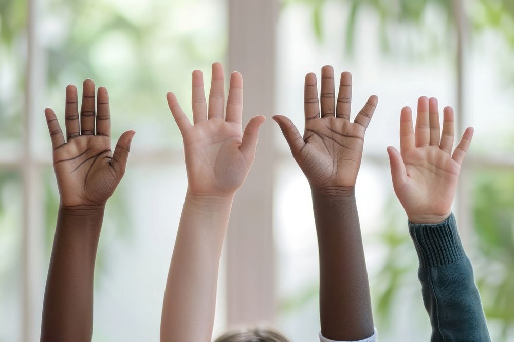 Raise hands of 5 mixed races people finger togetherness gesturing.