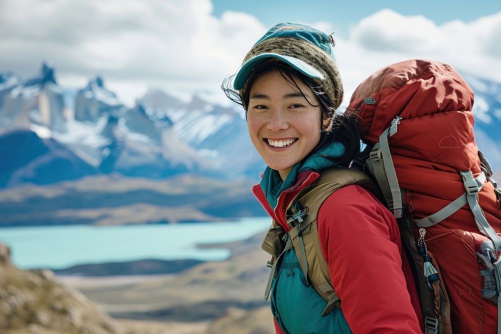 Vietnamese woman hiking patagonia backpacking adult mountaineering.
