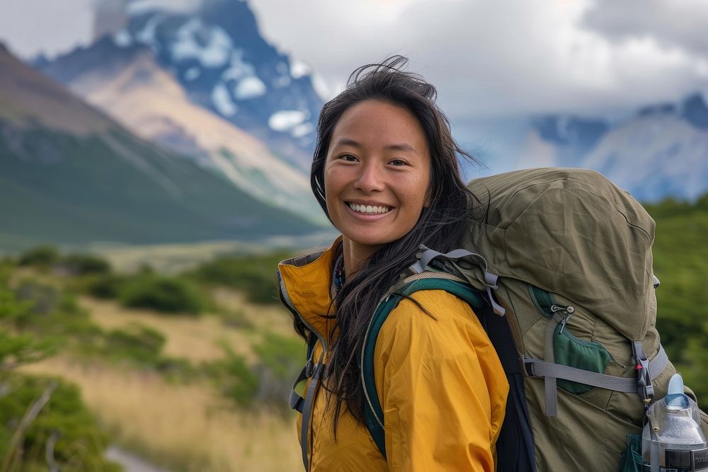 Vietnamese woman hiking patagonia backpacking adult mountaineering.