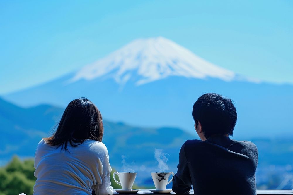 Asian couple with hot coffee mountain outdoors nature.