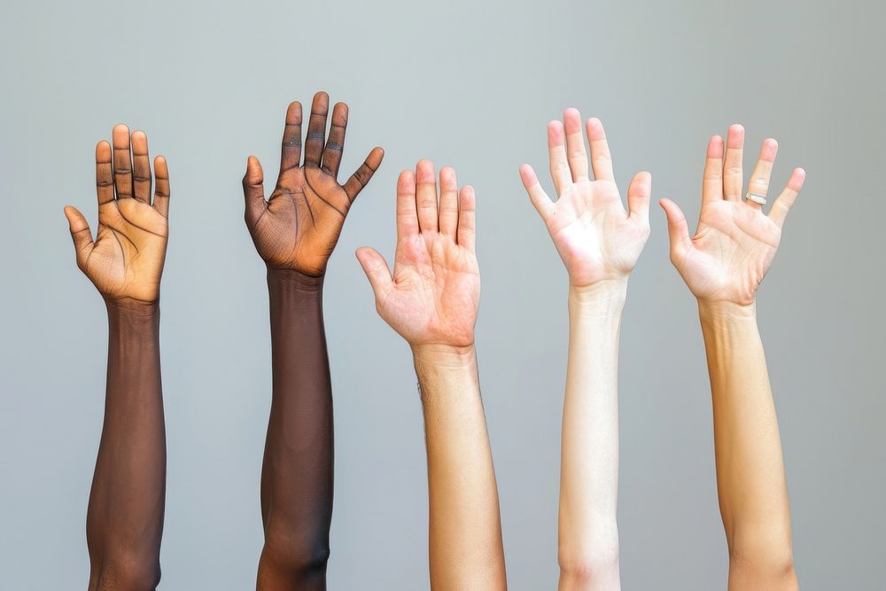 Arms and hands raising of 4 mixed races people finger gesturing person.