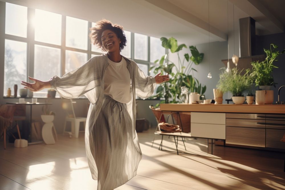 Black woman dances in the living room adult architecture accessories.
