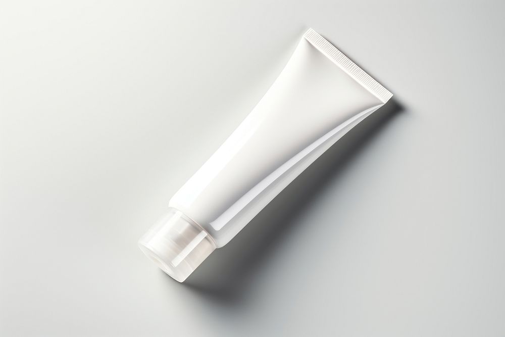 Tube skincare  white background toothpaste cosmetics.