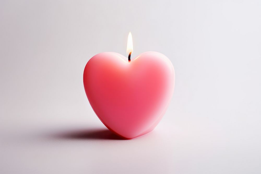 Heart shape candle pink illuminated celebration.