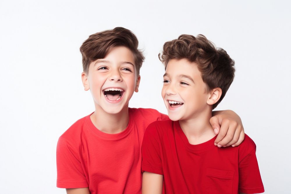 Two boys singing their hearts out laughing smile child.