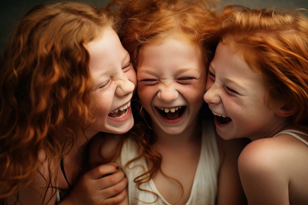Ginger hair girl giggling with friends laughing portrait adult.