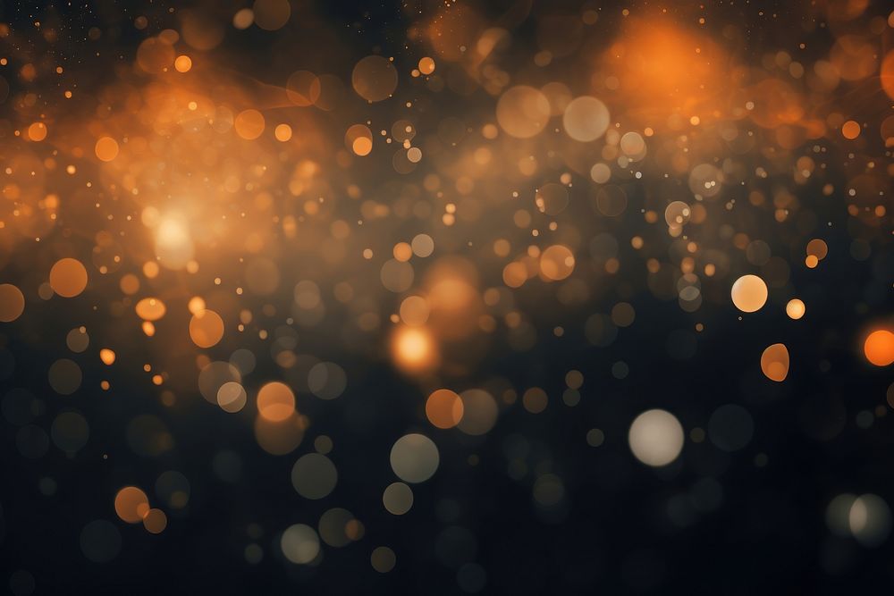 Black and orange bokeh effect background light backgrounds abstract.