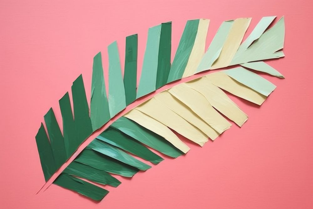 Abstract tropical leaf ripped paper plant art handicraft.