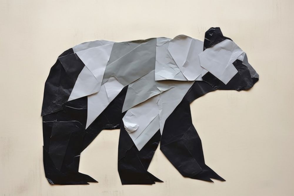 Abstract bear ripped paper art origami representation.