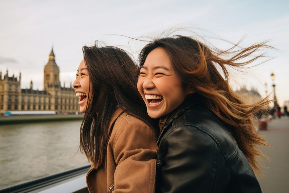 Mixed race friends travel london cheerful laughing adult.