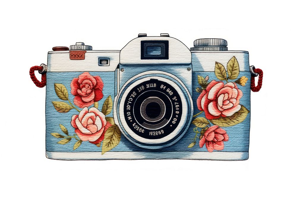 Vintage camera in embroidery style pattern photographing electronics.