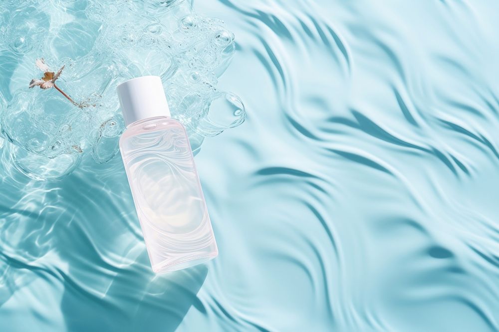 White skincare bottle on water floor pattern refreshment recreation container.