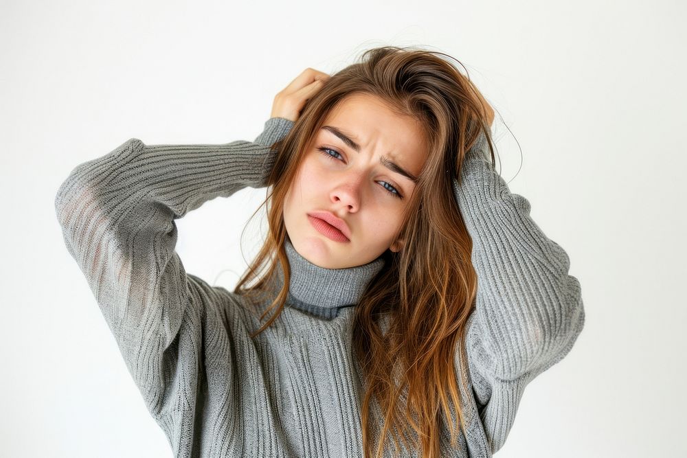 Woman tired and sick expression worried sweater photo.