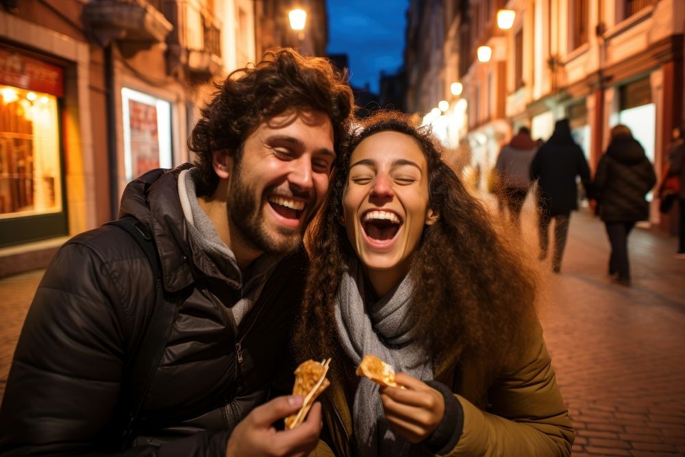 Couple eating churros laughing street adult.